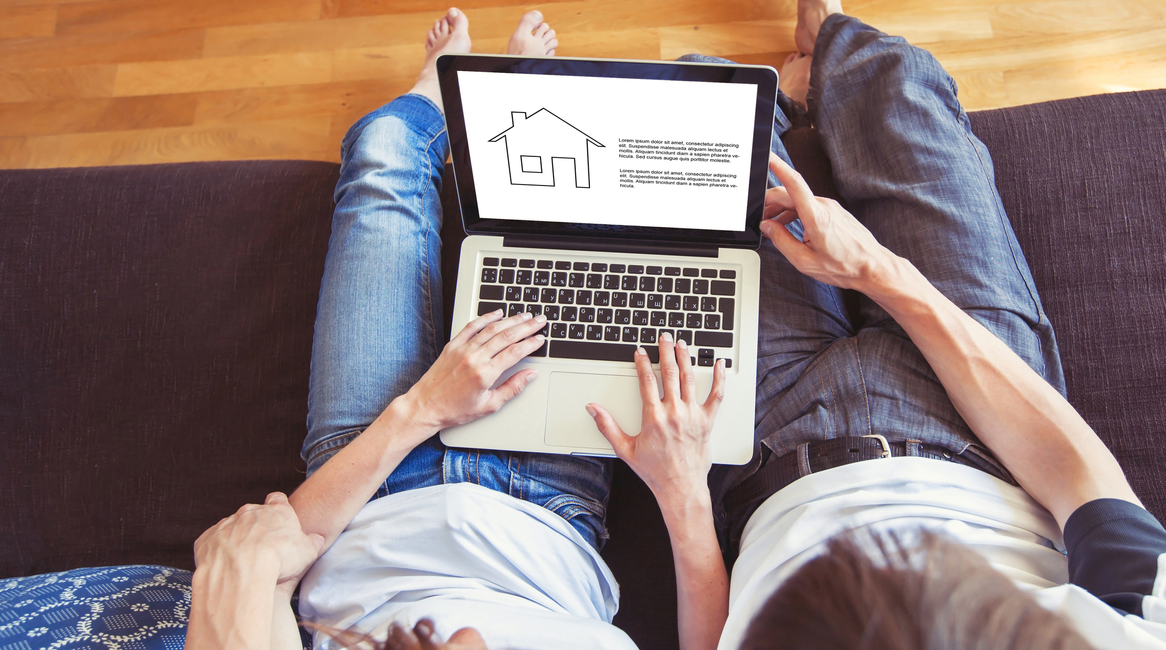 Couple browsing online house tool