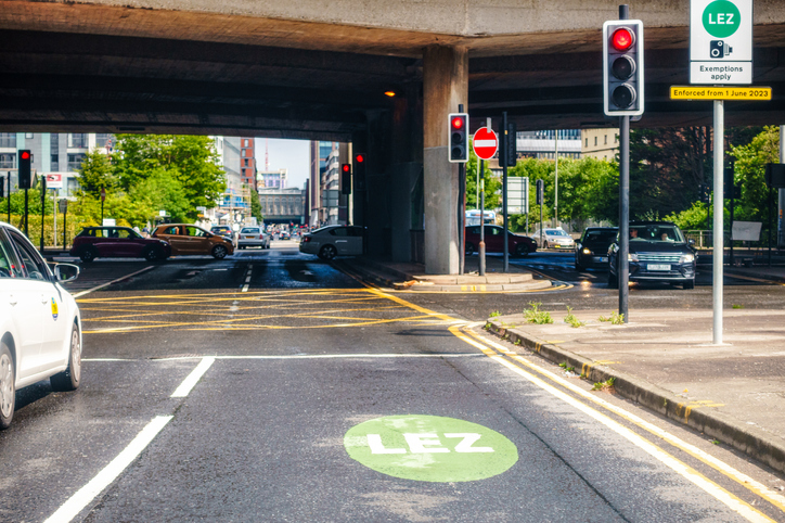 a road in Glasgow with low emission zone signage 