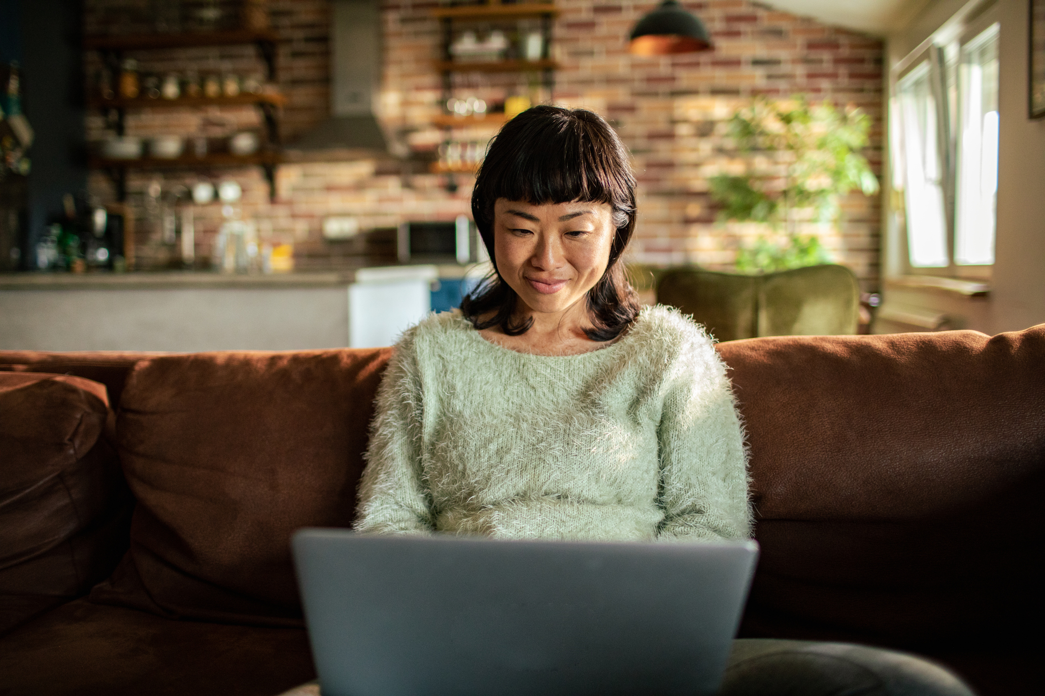 A woman using her laptop