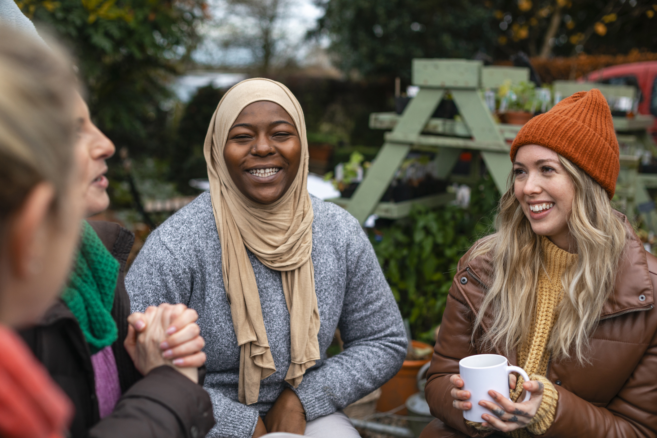 Two people at a climate hub gathering