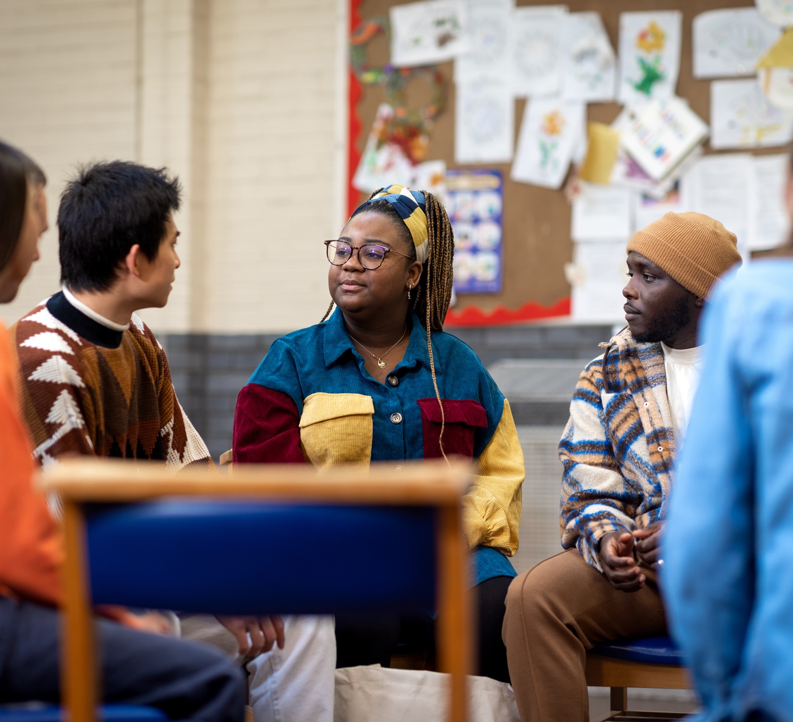 A group of people engaged in discussion.