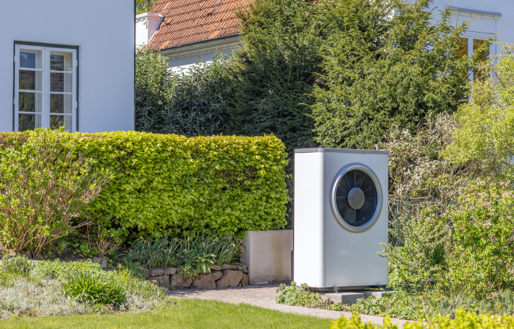 An air source heat pump outside a home