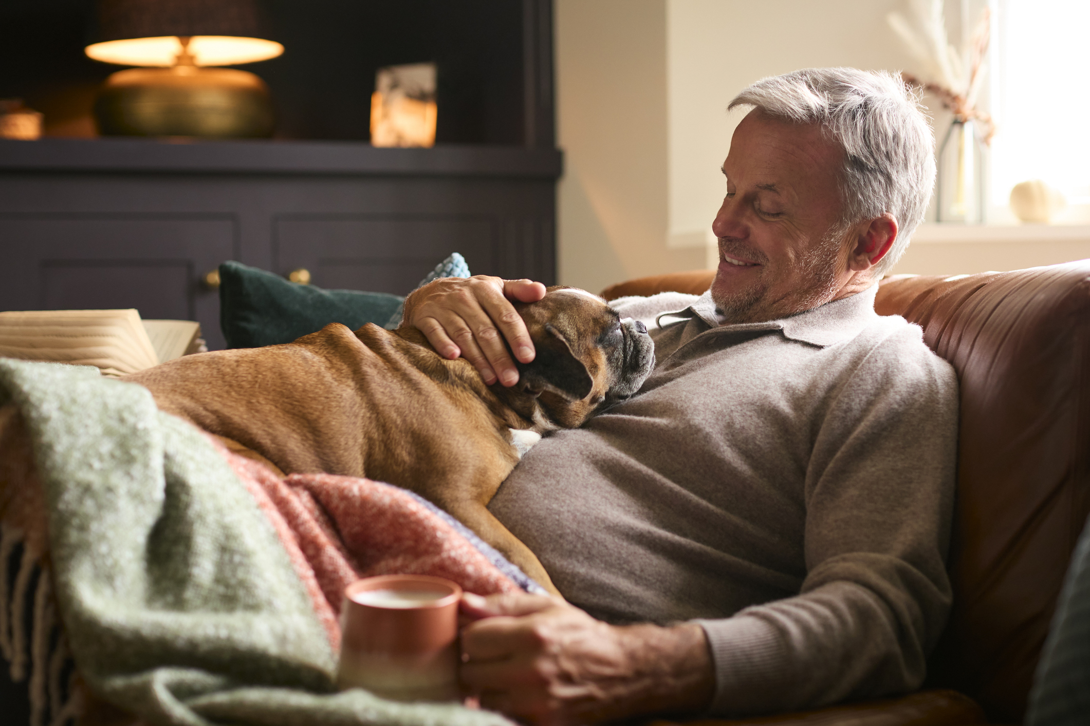 Person_relaxing_with_pet_1212x1414