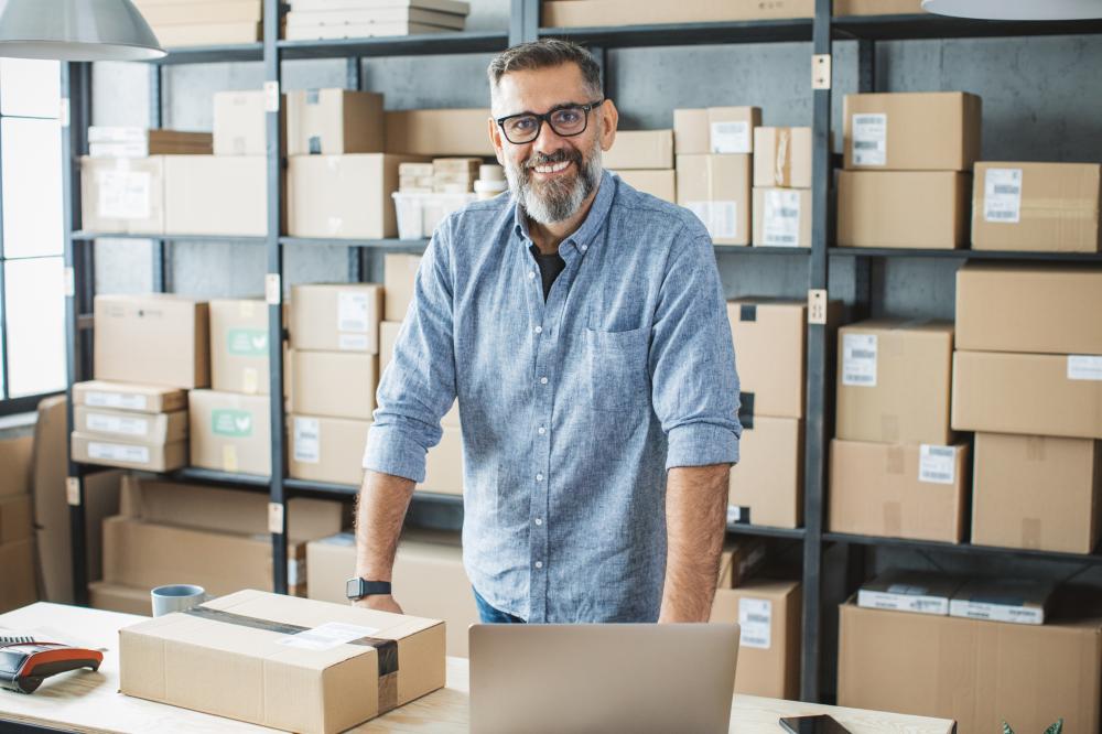 Small business owner smiling