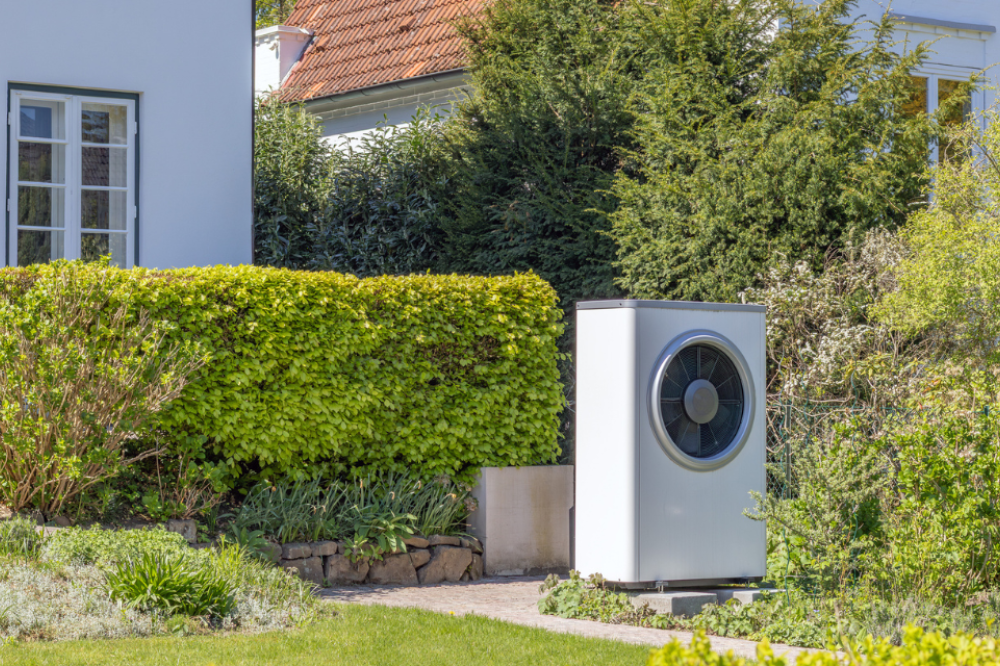 An air source heat pump outside a home
